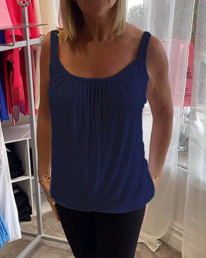 Casual sleeveless top with pleats and solid color