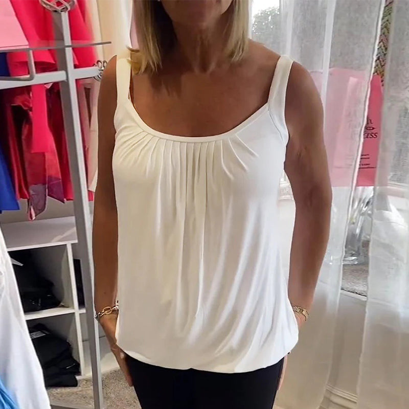 Casual sleeveless top with pleats and solid color
