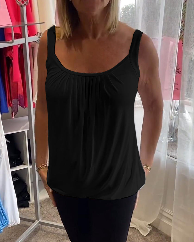 Casual sleeveless top with pleats and solid color
