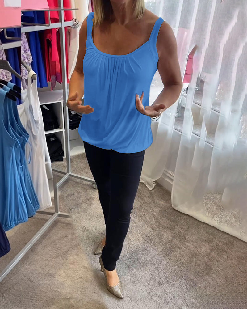 Casual sleeveless top with pleats and solid color
