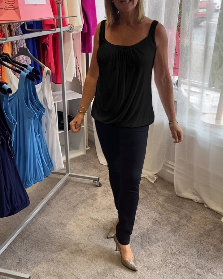 Casual sleeveless top with pleats and solid color