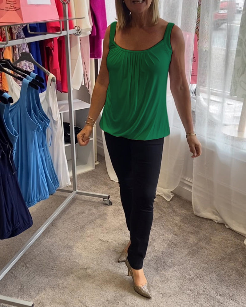 Casual sleeveless top with pleats and solid color