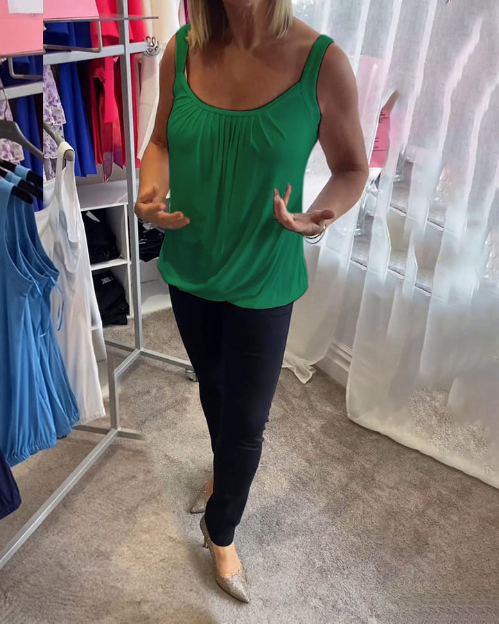 Casual sleeveless top with pleats and solid color