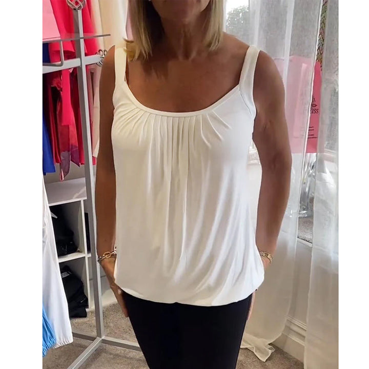 Casual sleeveless top with pleats and solid color
