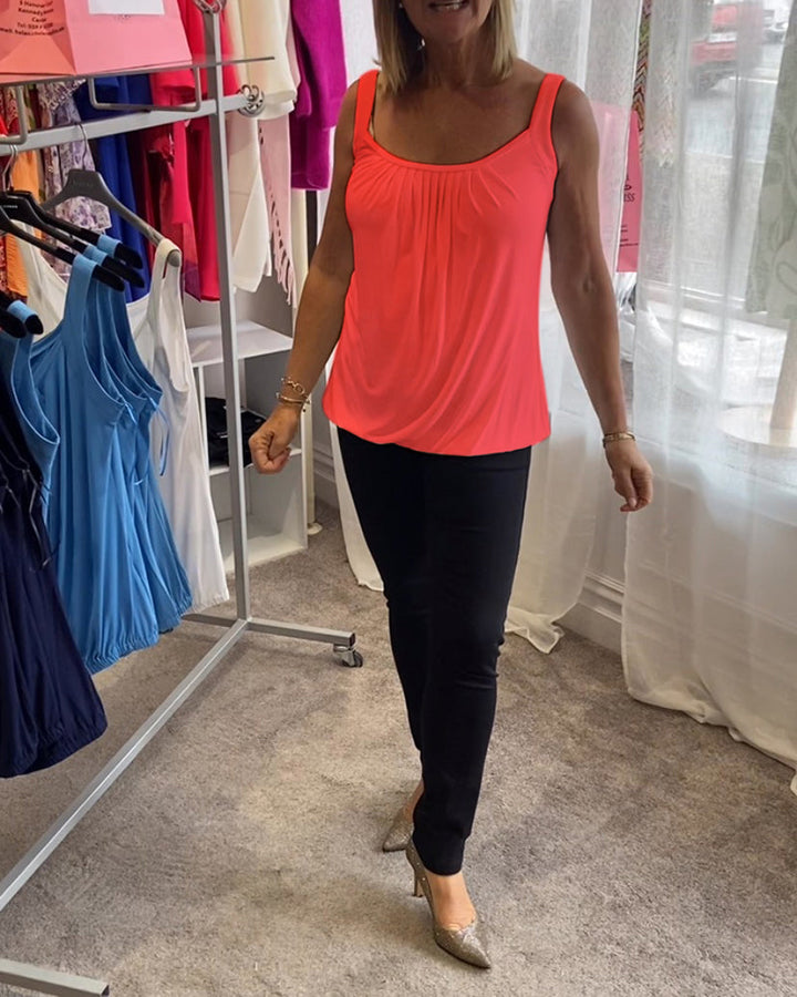 Casual sleeveless top with pleats and solid color