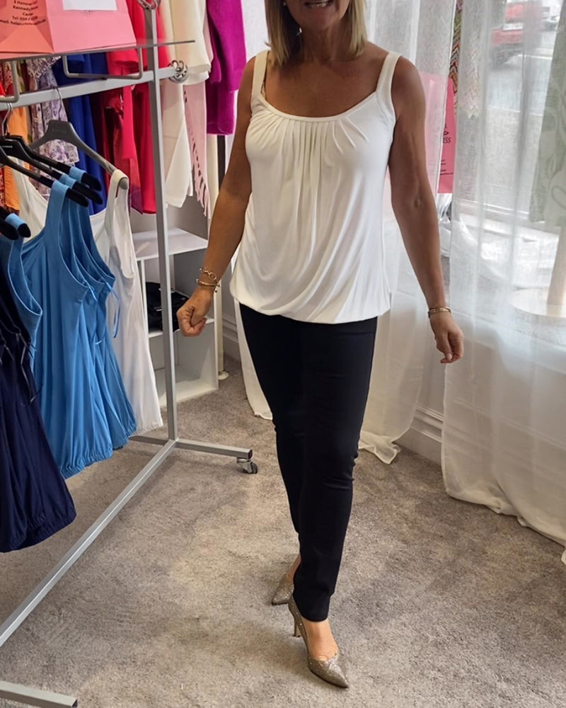 Casual sleeveless top with pleats and solid color