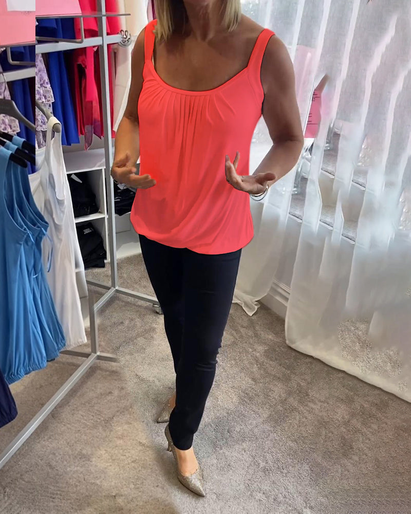 Casual sleeveless top with pleats and solid color